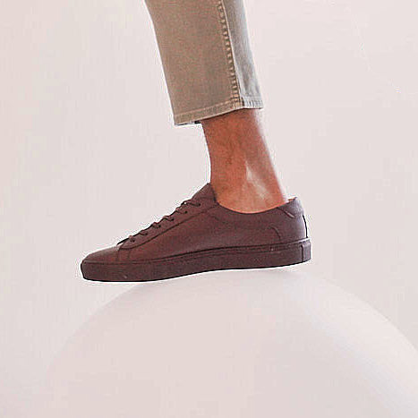 Foot with a shoe, and no sock visible between shoe top and pant leg bottom | ONDO